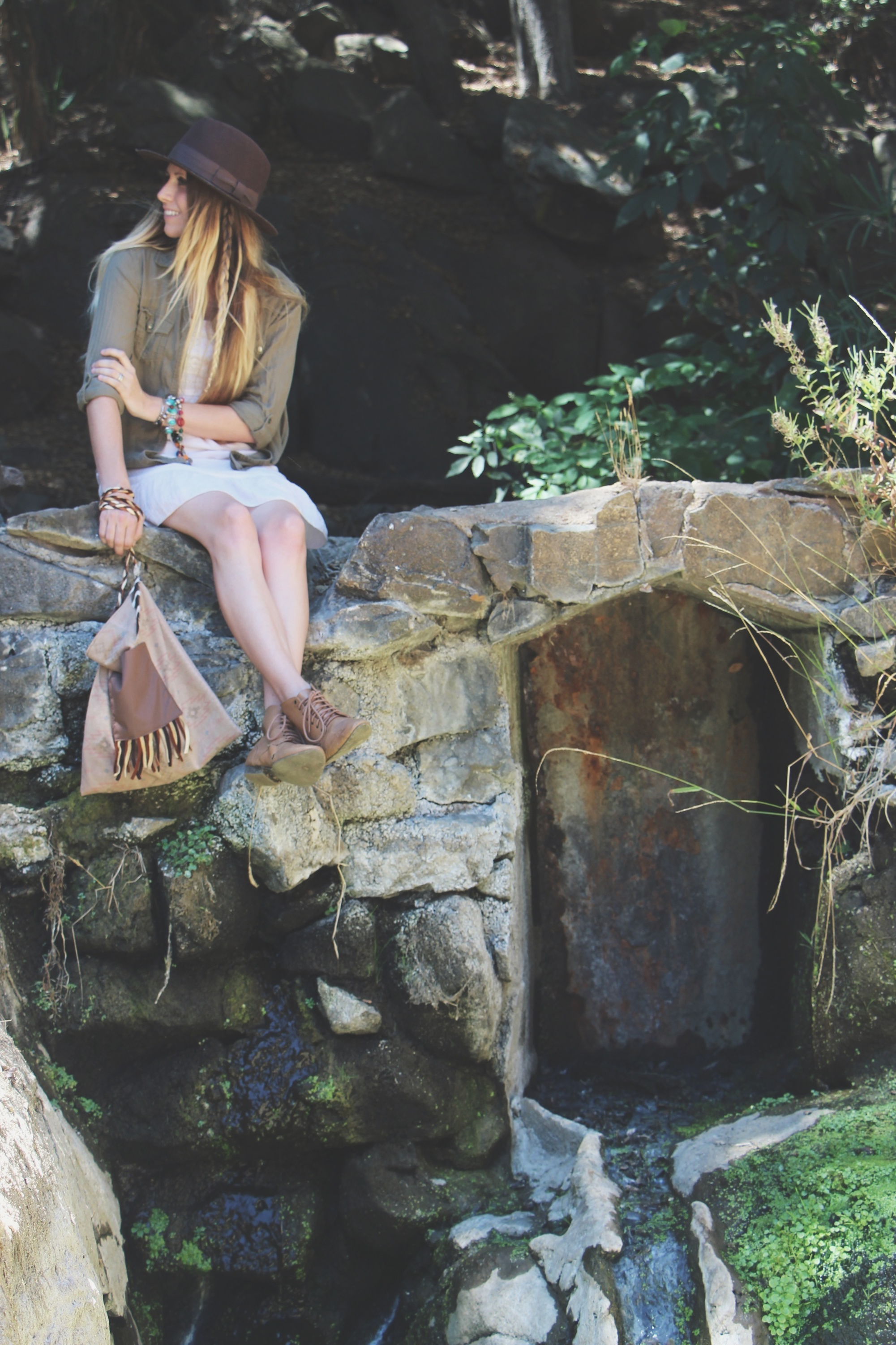 aztec print bag with braided leather handle. 